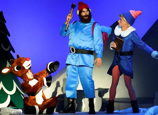Rudolf actor in a blue suit