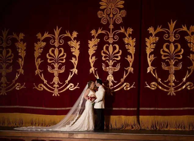 bride and groom on stage